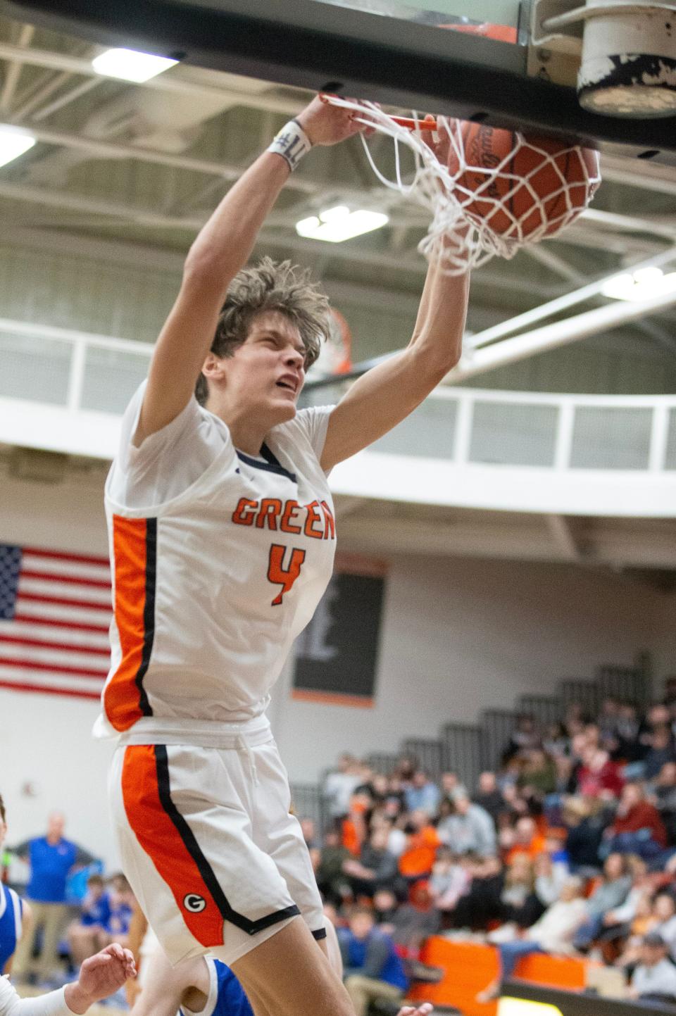 Green's Nikola Bundalo throws down a dunk in the second half of a boys high school basketball game against Lake at Green, Friday, January 27, 2023.