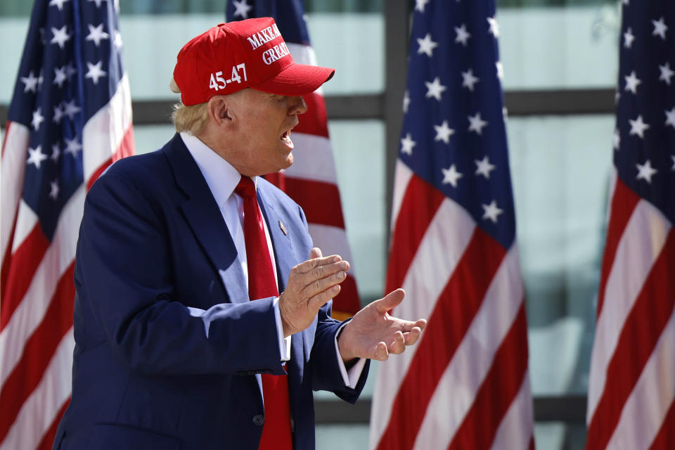 FILE - Republican presidential candidate former President Donald Trump enters at a campaign event, June 18, 2024, in Racine, Wis. Manhattan prosecutors are urging the judge overseeing Donald Trump’s criminal hush money case to uphold a gag order that bars the Republican former president from criticizing jurors, court staff, or members of the prosecution that convicted him. In court papers filed Friday, prosecutors with the Manhattan district attorney’s office argued portions of the gag order remained necessary given Trump’s “singular history of inflammatory and threatening public statements." (AP Photo/Jeffrey Phelps, File)