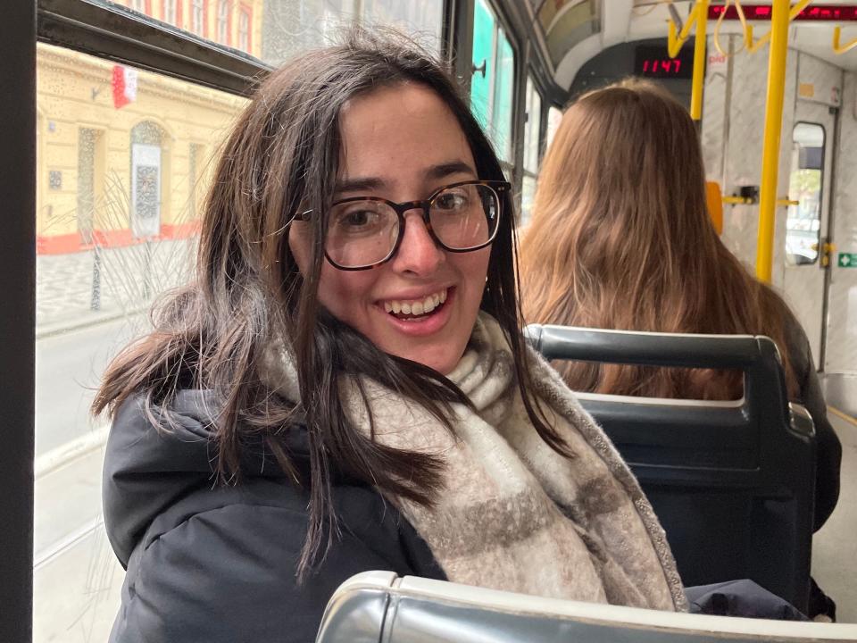 hannah riding public transportation in prague