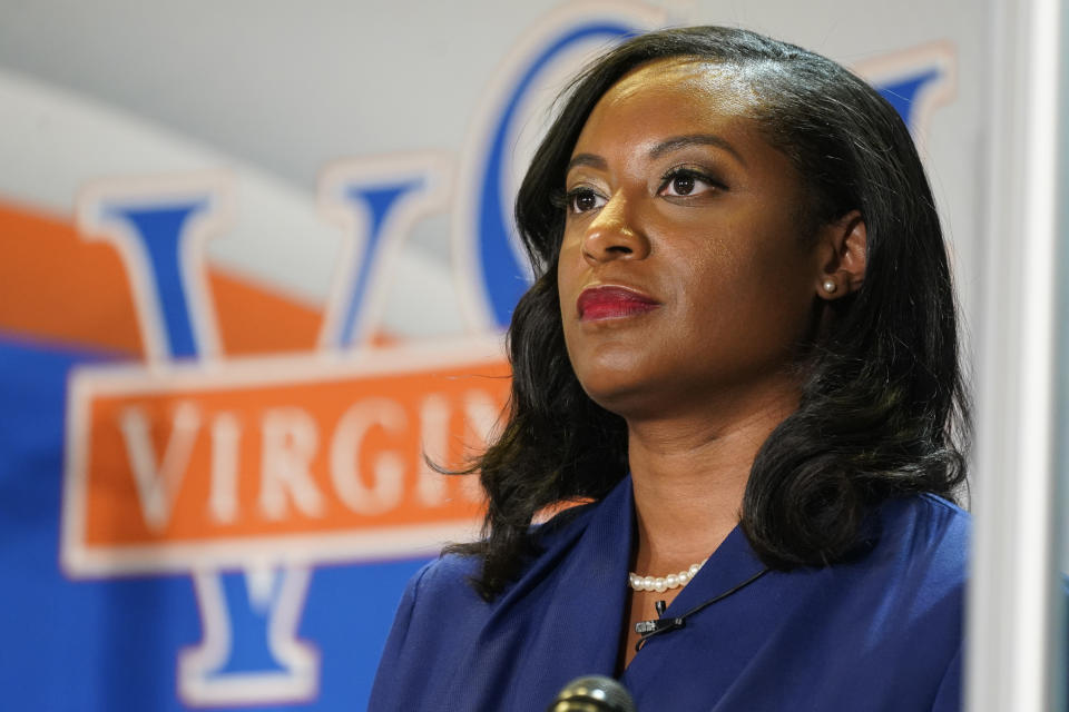 FILE - In this April 6, 2021, file photo Democratic candidate for Governor of Virginia Del. Jennifer Carroll Foy prepares for a debate at Virginia Sate University in Petersburg, Va. Foy and Virginia state Sen. Jennifer McClellan are trying to break another barrier in Virginia by becoming the first Black woman to win a governor's race. (AP Photo/Steve Helber, File)