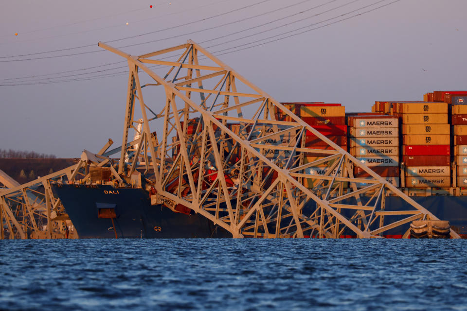 Wreckage of the Francis Scott Key Bridge rests on the container ship Dali, Saturday, March 30, 2024, in Baltimore, Md. (AP Photo/Julia Nikhinson)