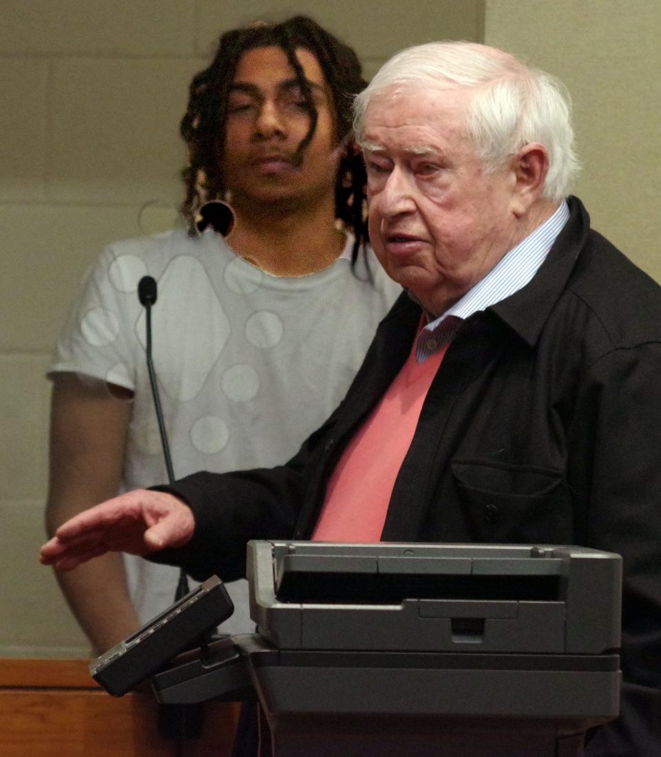 Kahmari T. Price, left, is arraigned in Brockton District Court on Monday, April 1, 2024, in the fatal shooting in Brockton of Mark A. Boyd of Quincy on Feb. 26, 2023. A judge ordered Price held without bail pending his next court hearing on May 1, 2024. To the right is his attorney.