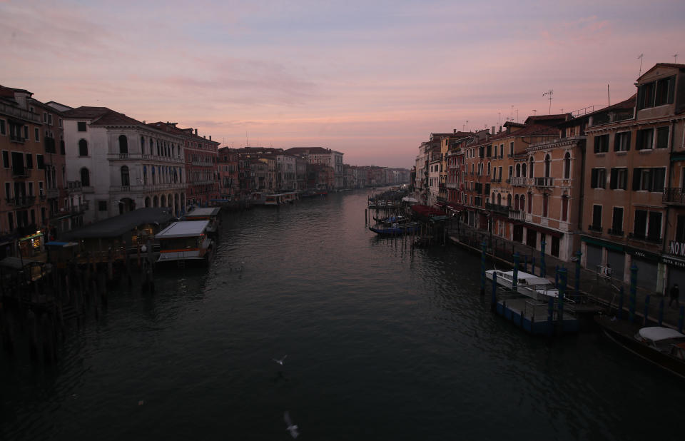 A view of the Canal Grande or Grand Canal, in Venice, Italy, Saturday, Jan. 30, 2021. The canal city's Carnival festivities should have started Saturday, but the COVID-19 pandemic made the annual appointment for more than two weeks of merry-making impossible. (AP Photo/Antonio Calanni)
