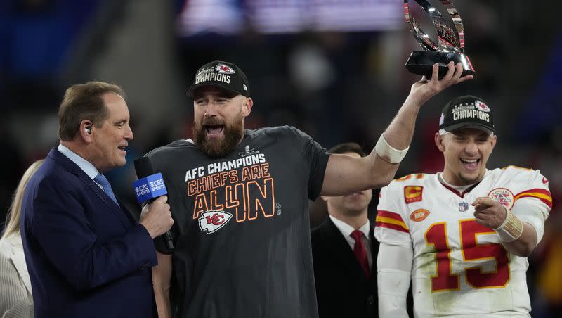 Kansas City Chiefs tight end Travis Kelce holds the Lamar Hunt trophy after an AFC Championship NFL football game against the Baltimore Ravens, Sunday, Jan. 28, 2024, in Baltimore. The Chiefs won 17-10.