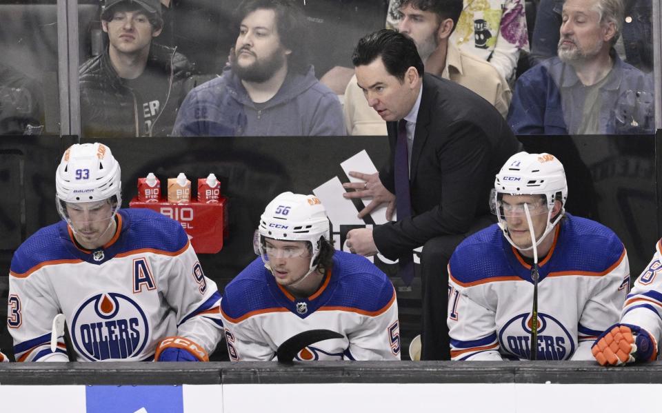 Edmonton Oilers coach Jay Woodcroft stands behind the bench during the second period in Game 6 of the team's NHL hockey Stanley Cup first-round playoff series against the Los Angeles Kings in Los Angeles on Saturday, April 29, 2023. (Keith Birmingham/The Orange County Register via AP)