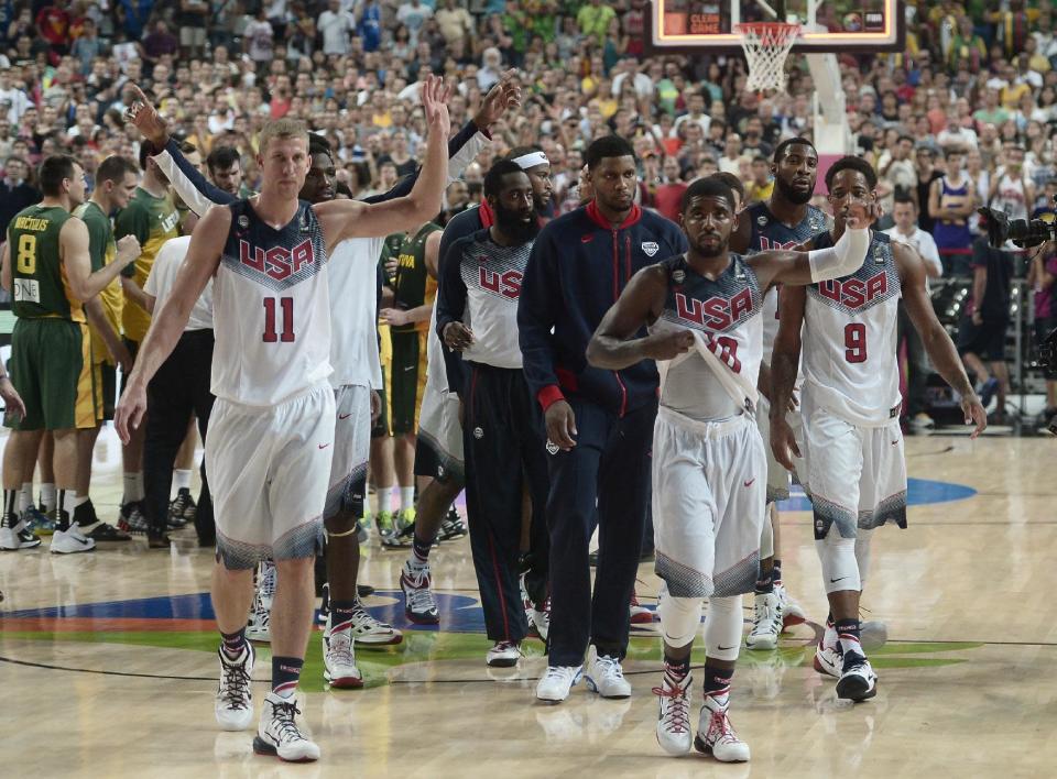 United States' players celebrate their side's 96-68 win over Lithuania at the end of a Basketball World Cup semifinal match at the Palau Sant Jordi in Barcelona, Spain, Thursday, Sept. 11, 2014. The 2014 Basketball World Cup competition will take place in various cities in Spain from Aug. 30 through Sept. 14. (AP Photo/Manu Fernandez)