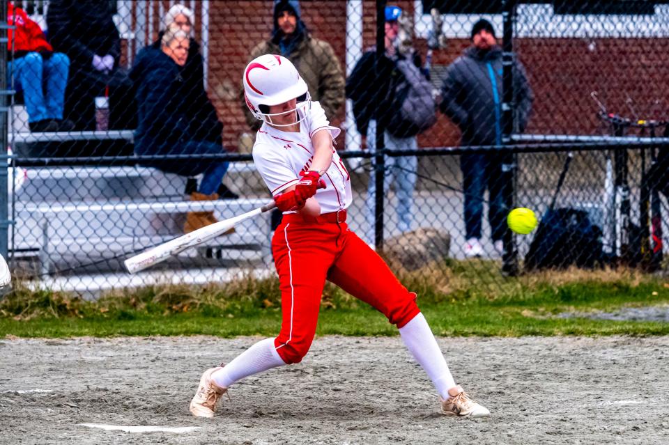 New Bedford's Amelia Davis drives the ball for a hit.