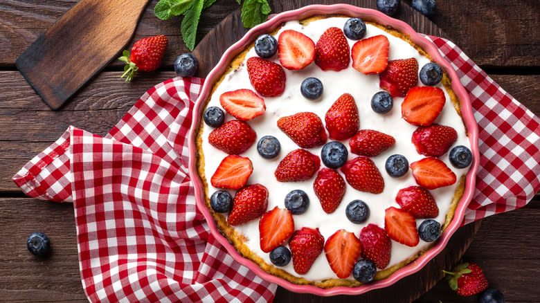 berry pie on red-checked cloth