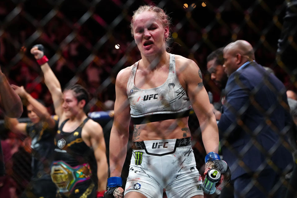Alexa Grasso (red gloves, background) and Valentina Shevchenko (blue gloves) react after their fight at Noche UFC was announced as a split draw. (Stephen R. Sylvanie, USA TODAY Sports)