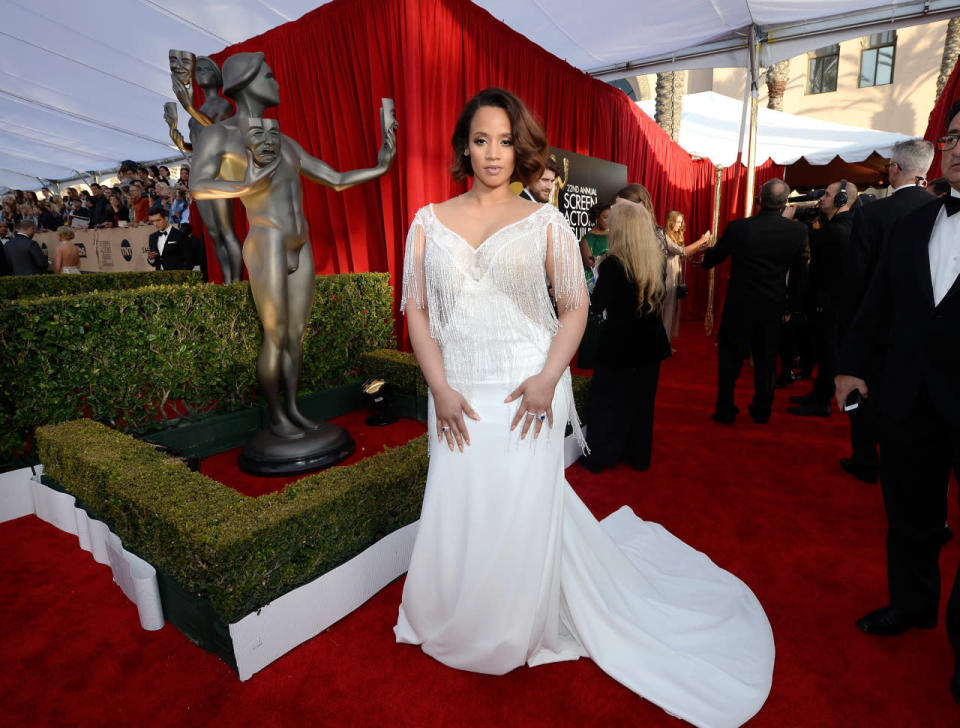 Dascha Polanco in a white flapper gown by Nurit Hen of Ista at the 22nd Annual Screen Actors Guild Awards at The Shrine Auditorium on January 30, 2016 in Los Angeles, California.