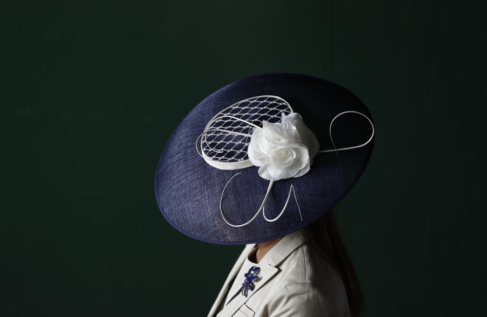 <p>A woman wears a fancy hat before the 143rd running of the Kentucky Derby horse race at Churchill Downs Saturday, May 6, 2017, in Louisville, Ky. (Photo: Matt Slocum/AP) </p>