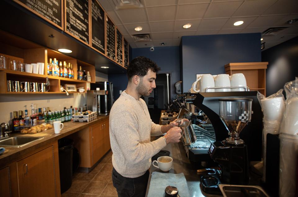 Tarek Chawich, 24, owner of Château Coffee Co. prepares a specialty coffee Thursday, Jan. 20, 2022, at his new coffee shop.