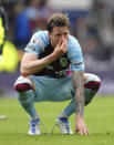 Burnley's Wout Weghorst reacts to relegation to the Championship following the English Premier League soccer match between Burnley and Newcastle United at Turf Moor, Burnley, England, Sunday, May 22, 2022. (Nick Potts/PA via AP)