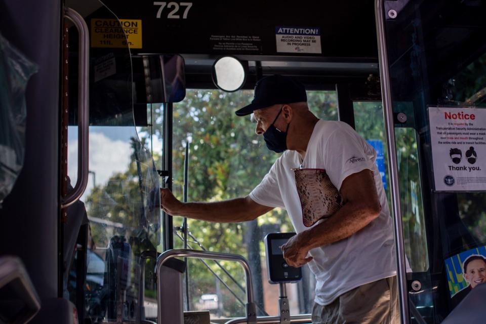 A rider gets on a WeGo bus at a stop along West End Avenue in Nashville, Tenn., on Friday, July 16, 2021. 