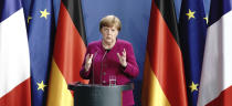 German Chancellor Angela Merkel speaks during a press conference following a joint video conference with French President Macron in Berlin, Germany, Monday, May 18, 2020. One topic was the Corona Pandemic and its consequences. (Kay Nietfeld/dpa via AP)