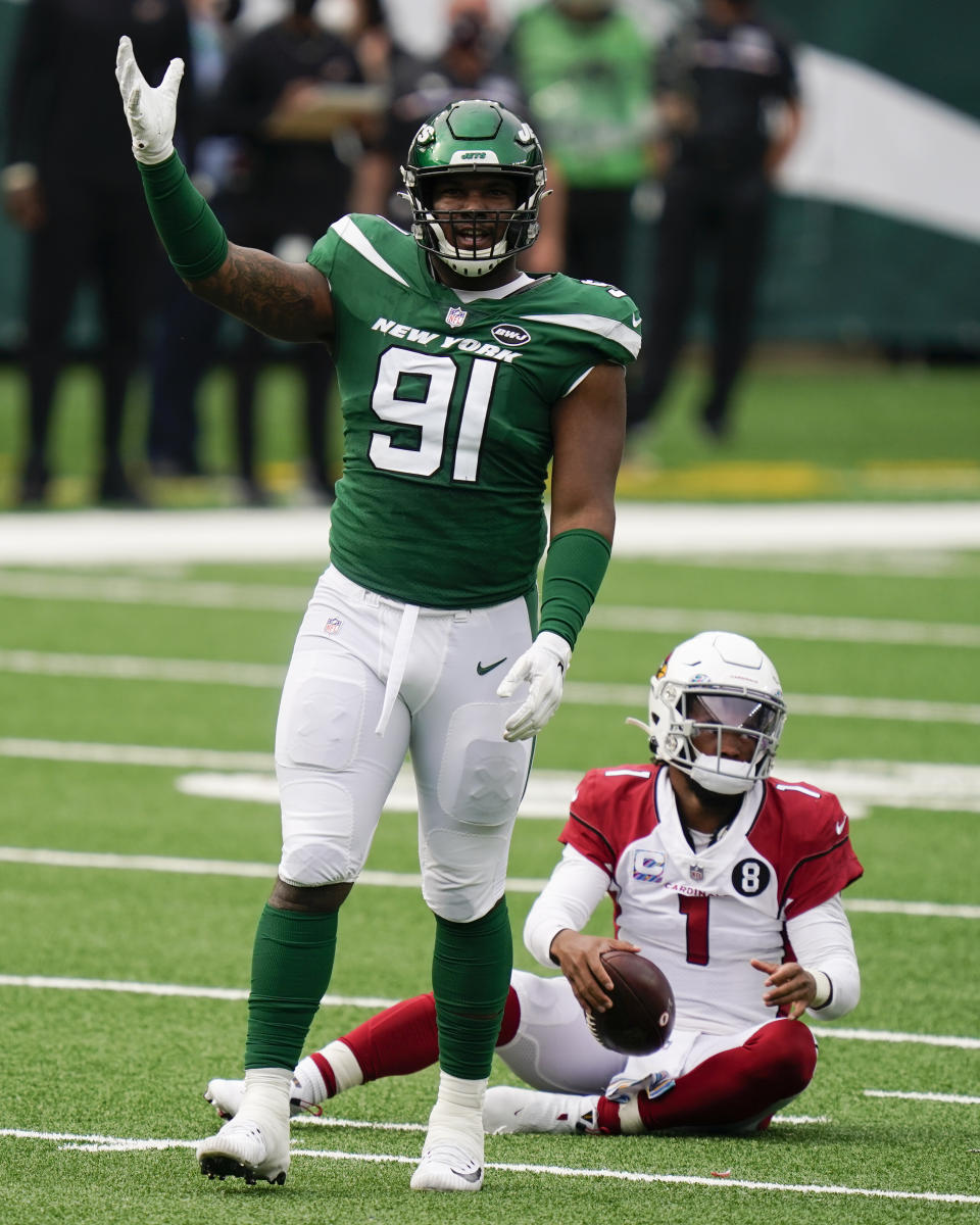 New York Jets defensive end John Franklin-Myers (91) reacts after sacking Arizona Cardinals quarterback Kyler Murray (1) during the second half of an NFL football game, Sunday, Oct. 11, 2020, in East Rutherford. (AP Photo/Seth Wenig)