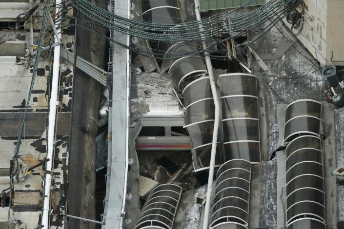 <p>A derailed New Jersey Transit train is seen under a collapsed roof after it derailed and crashed into the station in Hoboken, N.J., on Sept. 29, 2016. (REUTERS/Carlo Allegri) </p>