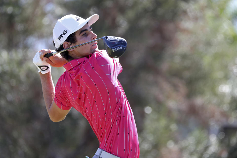 Joaquin Niemann, of Chile, drives off the first tee during the third round at the Sony Open golf tournament Saturday, Jan. 16, 2021, in Honolulu. (AP Photo/Marco Garcia)