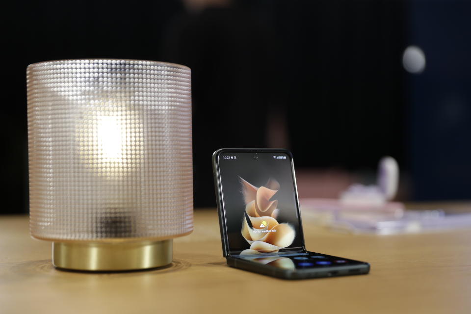 Samsung Galaxy Flip 3 is displayed on Monday, Aug. 9, 2021 at Samsung KX in London. Samsung is hoping cheaper but more durable versions of its foldable phones will broaden the appeal of a high-concept design that’s so far fizzled with consumers. (AP Photo/Tristan Werkmeister)