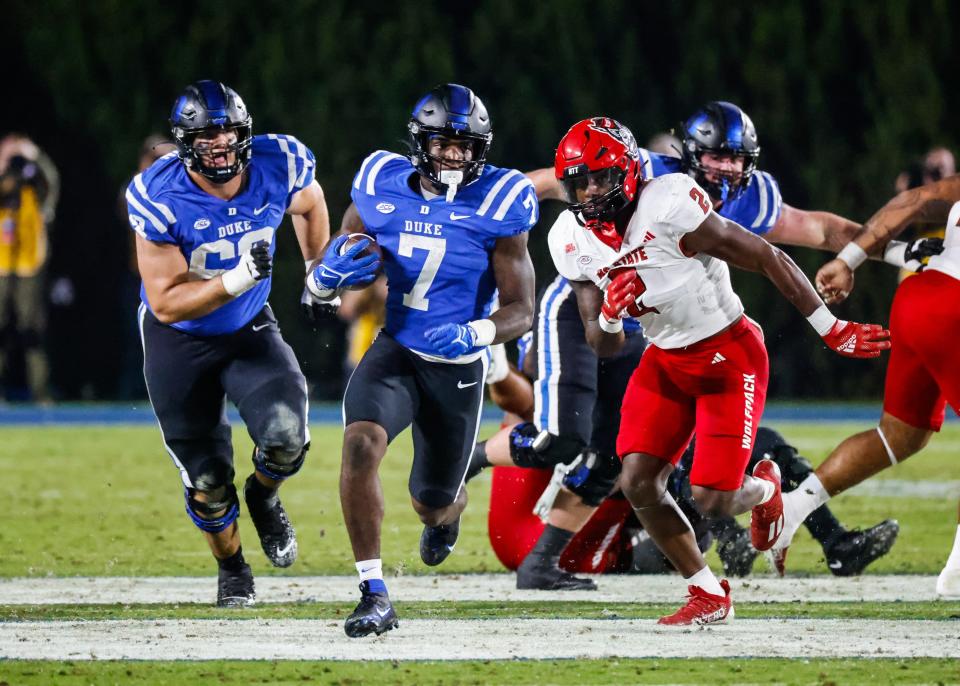 Oct 14, 2023; Durham, North Carolina, USA; Duke Blue Devils running back Jordan Waters (7) runs with the football during the first half of the game against North Carolina State Wolfpack at Wallace Wade Stadium. Mandatory Credit: Jaylynn Nash-USA TODAY Sports