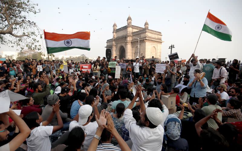 Demonstrators attend a protest against attacks on the students of New Delhi's Jawaharlal Nehru University (JNU), outside the Gateway of India monument in Mumbai