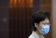 Hong Kong Chief Executive Carrie Lam speaks during a press conference at a polling center for the election committee that will vote for the city's leader in Hong Kong Sunday, Sept. 19, 2021. Hong Kong's polls for an election committee that will vote for the city's leader kicked off Sunday amid heavy police presence, with chief executive Carrie Lam saying that it is "very meaningful" as it is the first election to take place following electoral reforms. (AP Photo/Vincent Yu)