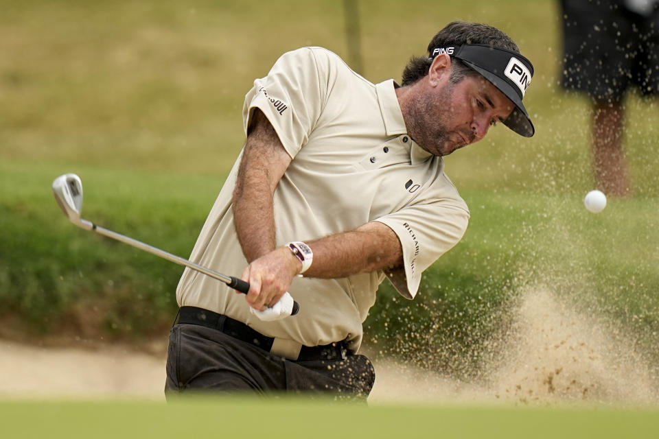 Bubba Watson hits from the bunker on the 14th hole during the second round of the PGA Championship golf tournament at Southern Hills Country Club, Friday, May 20, 2022, in Tulsa, Okla. (AP Photo/Eric Gay)