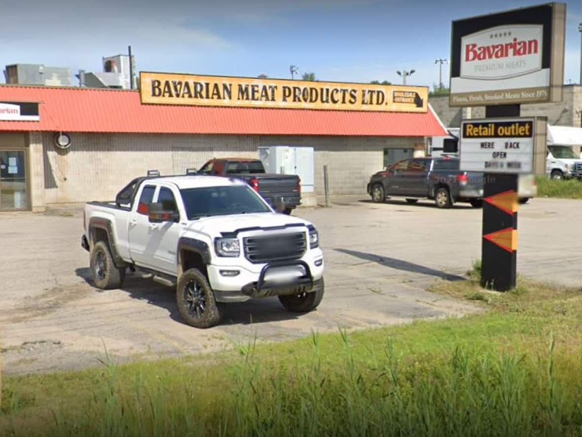 Bavarian Meat Products, a butcher shop on Wallace Road in North Bay, Ont., closed for business in October 2021, but new owners left tonnes of meat to decay inside. (Screenshot from Google Maps - image credit)