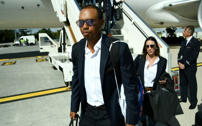 Tiger Woods touched down in France just hours after winning his first tournament for five years