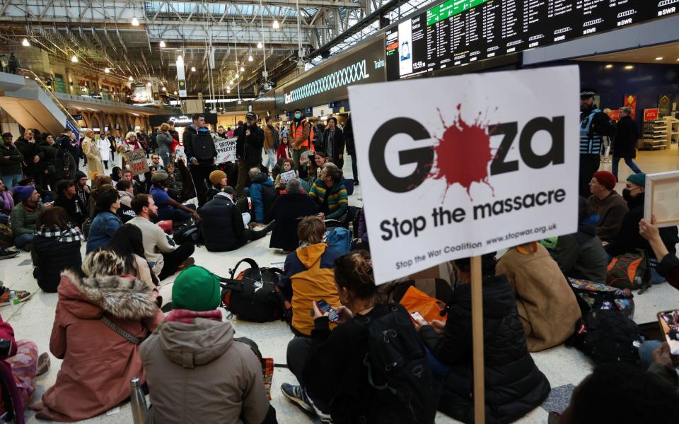 Pro-Palestinian protesters during a sit-in at Waterloo Station on November 11, 2023