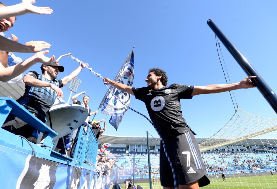 CF Montreal's Ahmed Hamdi (7) rings the 1642 bell after a 2-0 win against the Chicago Fire FC at Stade Saputo on Sept. 19.