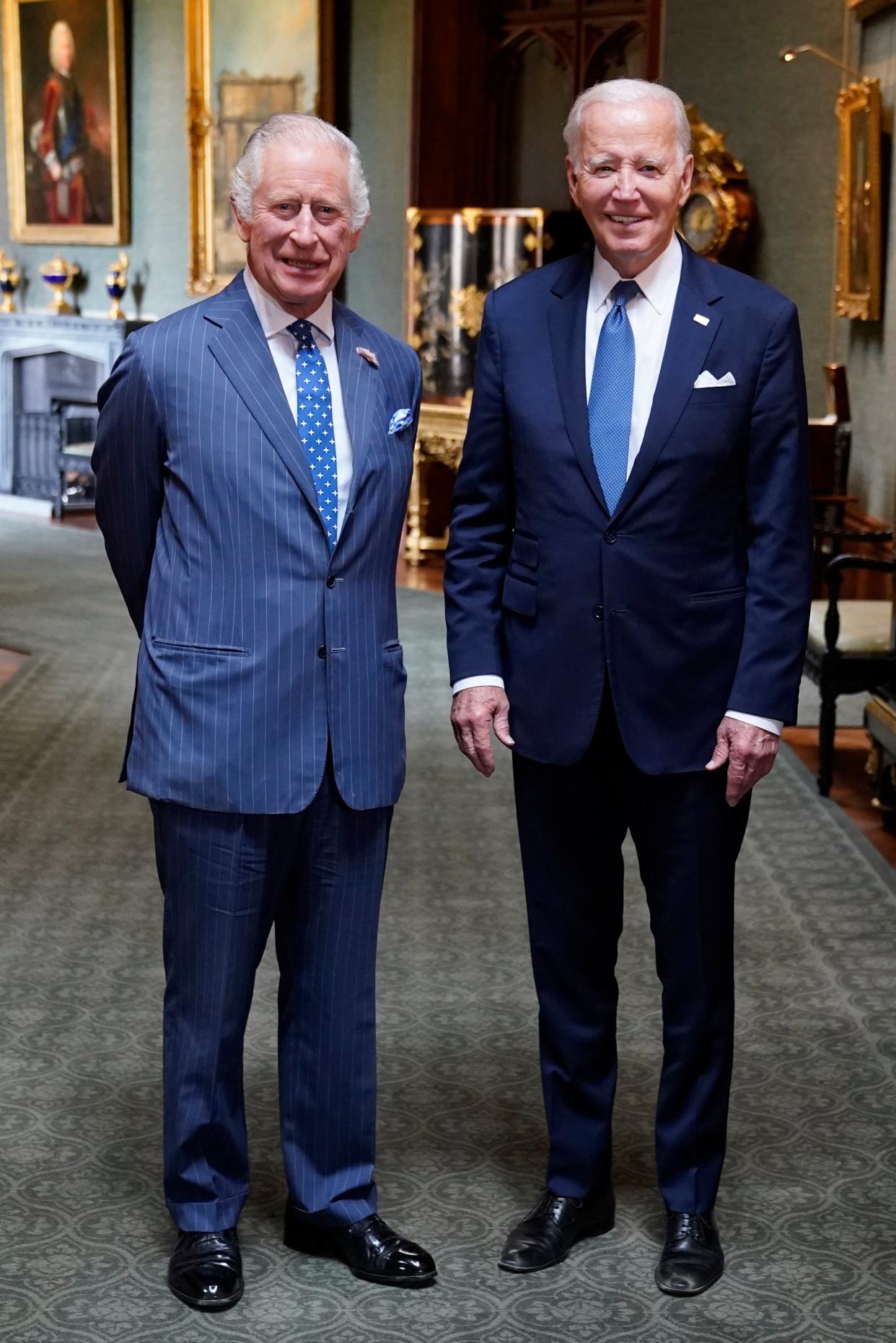 King Charles III and US President Joe Biden in  the Grand Corridor at Windsor Castle (PA)