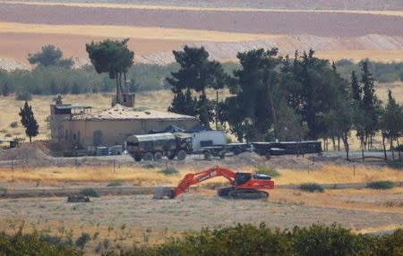 A Turkish military post is pictured on the Turkish-Syrian border in Karkamis in the southeastern Gaziantep province, Turkey, August 24, 2016. REUTERS/Umit Bktas