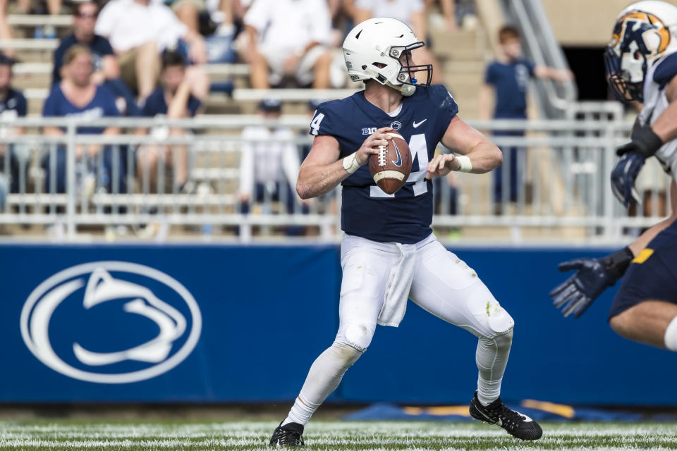 STATE COLLEGE, PA - SEPTEMBER 15: Sean Clifford #14 of the Penn State Nittany Lions throws a pass for a touchdown against the Kent State Golden Flashes during the second half at Beaver Stadium on September 15, 2018 in State College, Pennsylvania.  (Photo by Scott Taetsch/Getty Images)