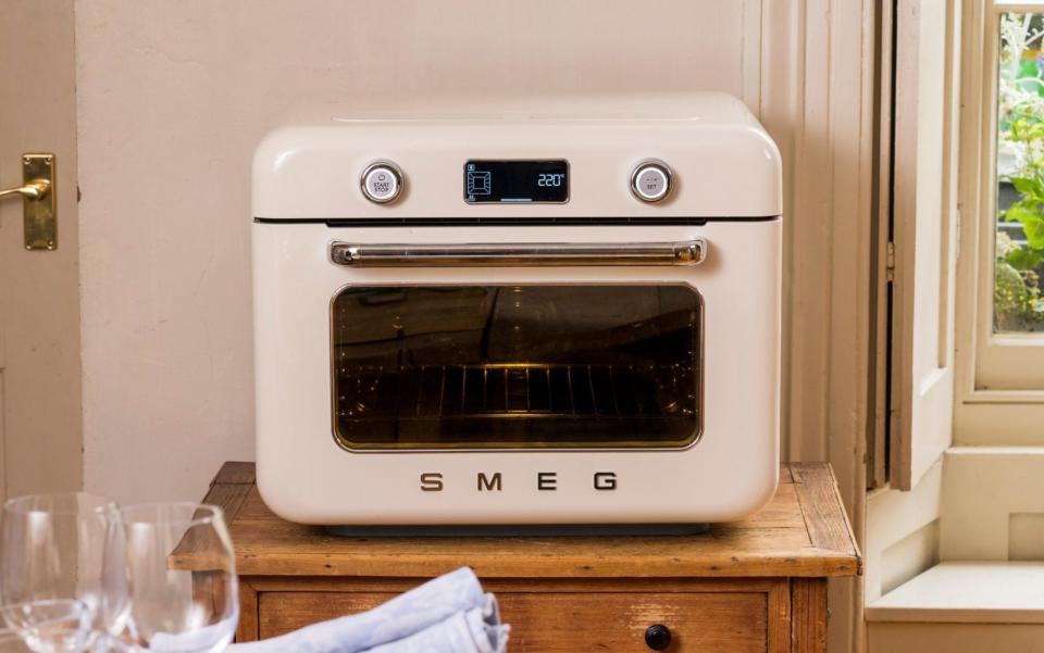 Much larger than you're used to in terms of oven size, but the Smeg still has incomprehensible instructions