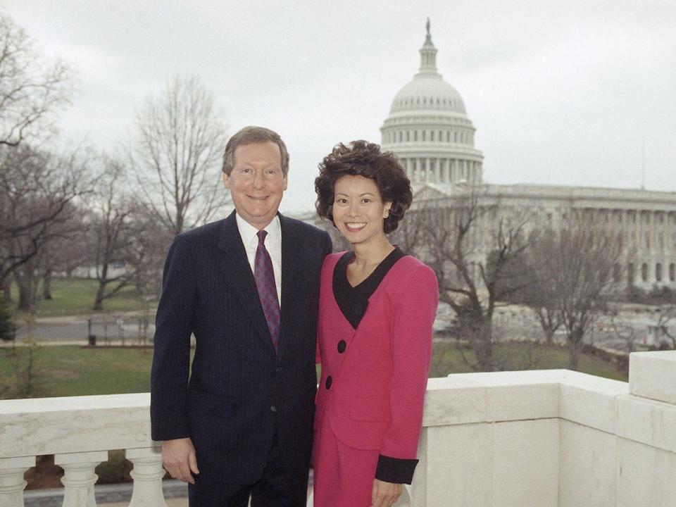 Mitch McConnell and Elaine Chao pose before their marriage in the chapel of the US Capitol on February 6, 1993.
