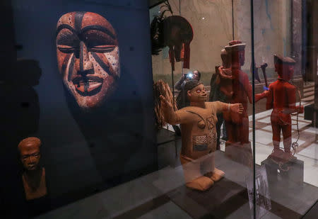 Statues and masks are seen in Belgium's Africa Museum before its reopening to the public on December 9, 2018, after five years of renovations to modernise the museum from pro-colonial propaganda exhibits to one that condemns colonisation, in Tervuren, Belgium December 6, 2018. Picture taken December 6, 2018. REUTERS/Yves Herman