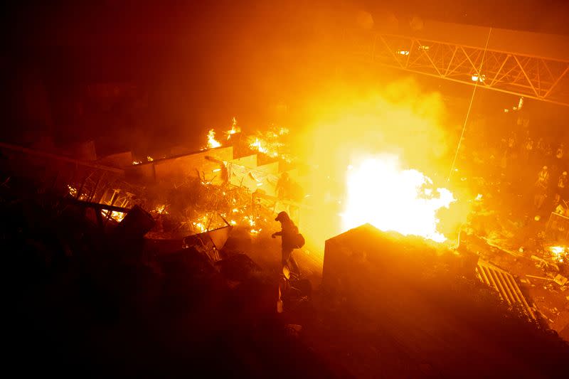 Pictures of the Year: Hong Kong protest tide turns into sea of flames