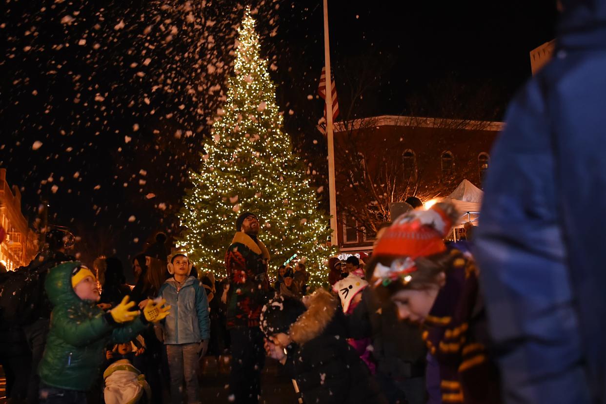 Children play in the 'snow' during the Montclair tree lighting in Montclair  on Friday December 7, 2018.  