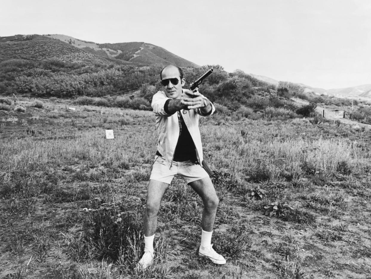 Shooting star: Thompson aims his Magnum on his ranch near Aspen, Colorado, in 1976: Getty