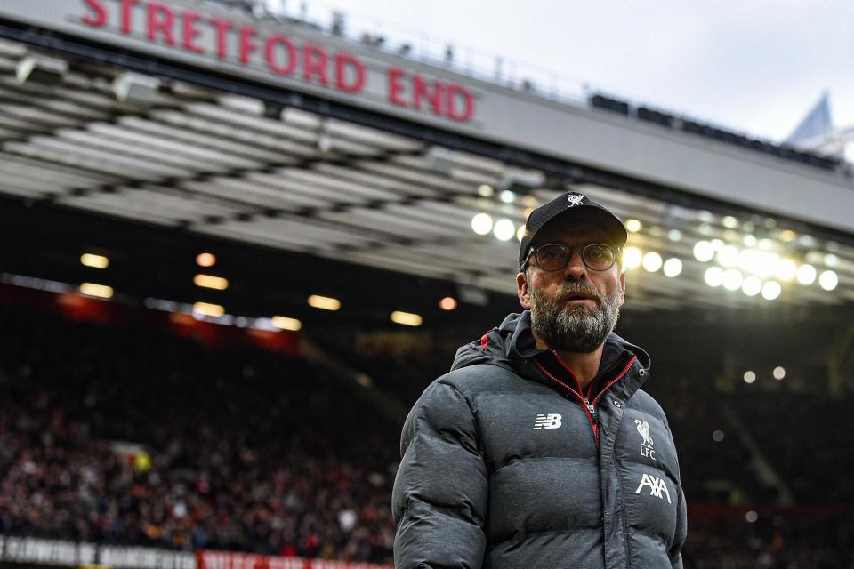 Even Klopp’s trademark grin would be put to the test at Old Trafford (Liverpool FC via Getty Images)