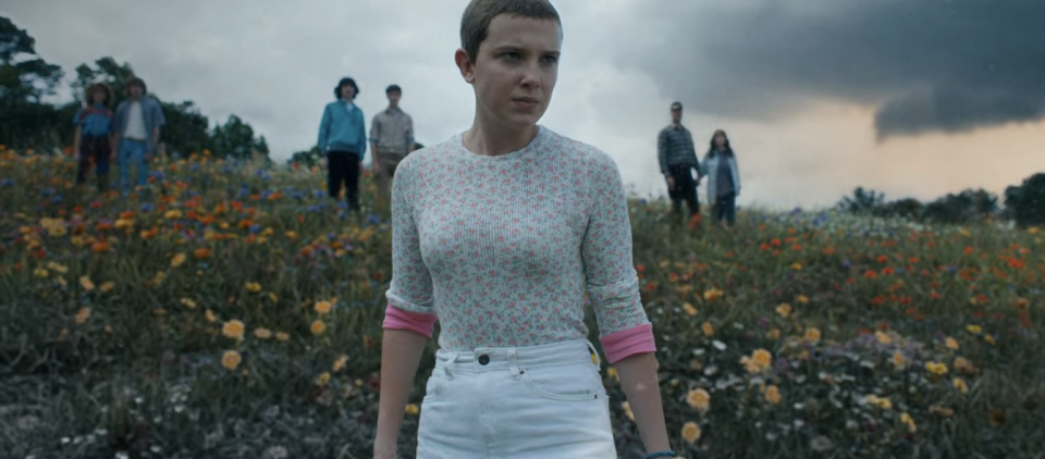 Eleven and the others on a hill in "Stranger Things"