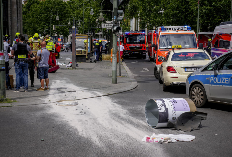 Picture shows the sccenery after a car crashed into a crowd of people in central Berlin, Germany, Wednesday, June 8, 2022. (AP Photo/Michael Sohn)
