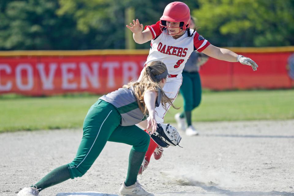Chariho third baseman Erin O'Leary prepares to apply the tag to Coventry's Sophie Chaignot during the third inning of the Oakers' win over the Chargers on Monday.