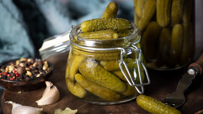 cornichons in glass jar with brine