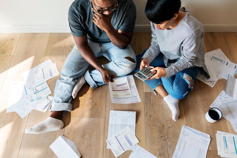 <span class="caption">Too many households are stuck in a debt trap.</span> <span class="attribution"><a class="link " href="https://www.shutterstock.com/image-photo/couple-managing-debt-1050973406?src=yTFgisO_2_R7E_03ub5xaw-1-9" rel="nofollow noopener" target="_blank" data-ylk="slk:Rawpixel / Shutterstock;elm:context_link;itc:0;sec:content-canvas">Rawpixel / Shutterstock</a></span>