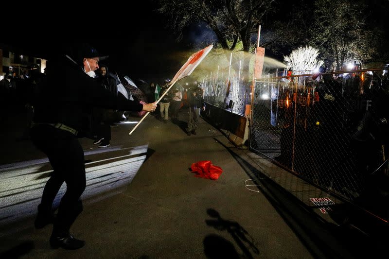 People protest outside the Brooklyn Center Police Department, days after former police officer Kim Potter fatally shot Daunte Wright, in Minnesota