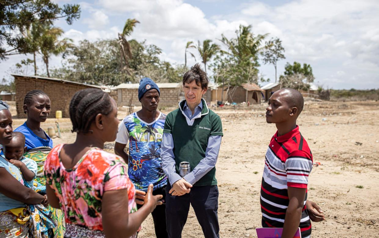 GiveDirectly president Rory Stewart speaks to residents from Mgandamwani village in Kilifi County, Kenya, on September 11, 2022 - Patrick Meinhardt for the Telegraph