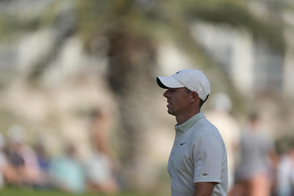 Rory McIlroy of Northern Ireland walks on the 12th fairway during final round of the Dubai Desert Classic golf tournament in Dubai, United Arab Emirates, Sunday, Jan. 30, 2022. (AP Photo/Kamran Jebreili)