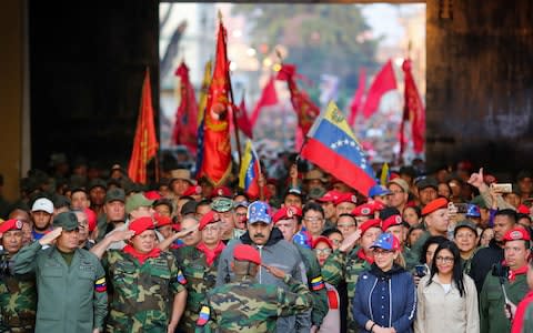 Venezuela's President Nicolas Maduro attending a military ceremony to commemorate the "27th Anniversary of the Military RebellionIA - Credit:  MARCELO GARCIA/ AFP